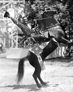 Tom Mix on the back of a horse
