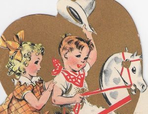 A vintage Valentine with a boy and girl.