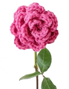 A rose made with crocheted stiches.