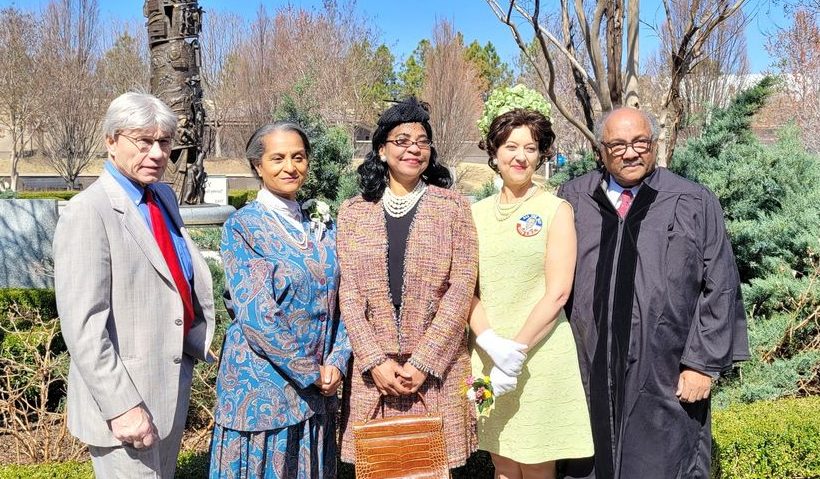 Five performers from Enid Chautauqua in the Park dressed in 1960s-style clothing. One man wears judge's robes.