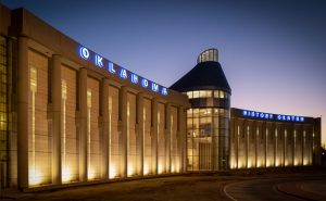 The exterior wings and lit columns of Oklahoma History Center building.
