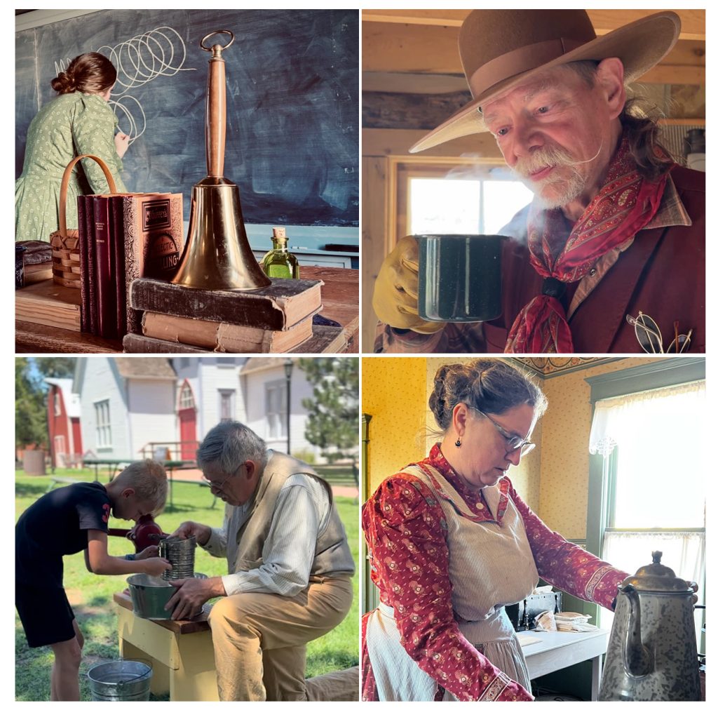A schoolmarm writes on a chalkboard. A man with a handlebar mustache and cowboy gear drinks a cup of coffee. A man assists a child to grind corn with a sifter. A reenactor works in the kitchen
