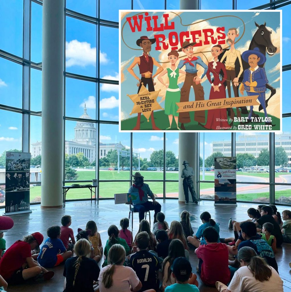 A man dressed in a cowboy outfit reading to a large group of children at the Oklahoma History Center. The inset is an image of the book cover 'Will Rogers and His Great Inspiration.'