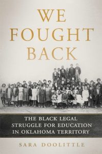 A book cover for 'We Fought Back' depicting a large group of Black schoolchildren and teachers.
