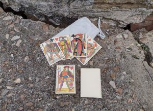 Civil War era cards lay on a concrete step at Fort Gibson.