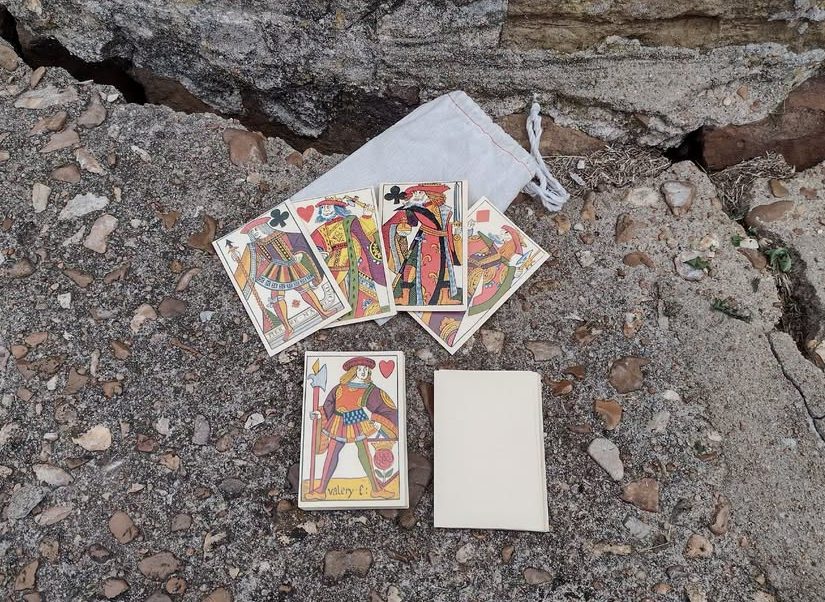 Civil War era cards lay on a concrete step at Fort Gibson.