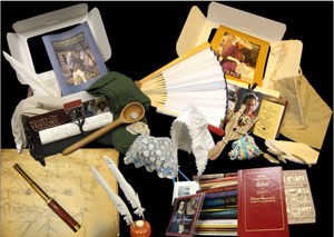 A fan, wooden spoon, quill pen, and other items from the Colonial Life trunk