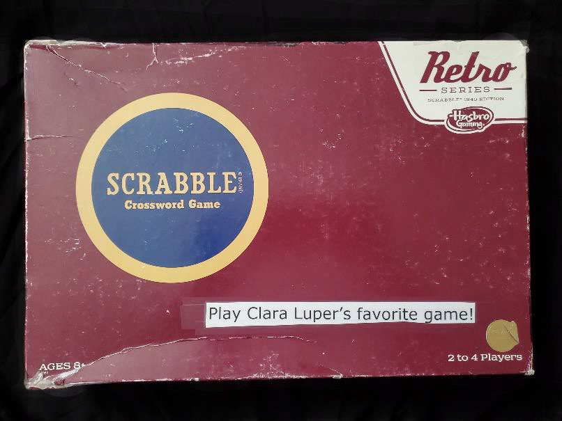 A vintage-style Scrabble board game box.