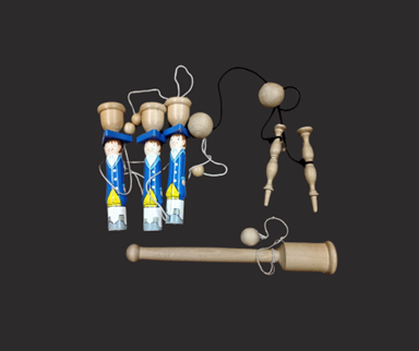 Wooden figures painted to resemble soldiers or men in colonial clothing with a cup on their head. A ball is attached to the pin with a thread. Another version is a smaller, more ornate shaped pin with a flattened top, also attached to a ball.