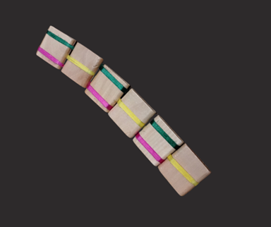 Six square wood pieces connected in a row with colorful ribbon.