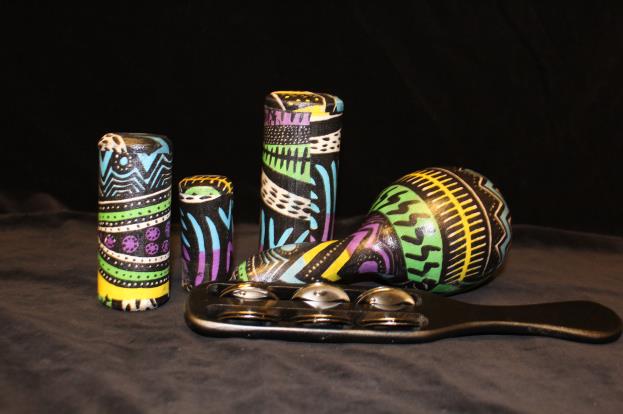 Wooden instruments with stylized patterns.