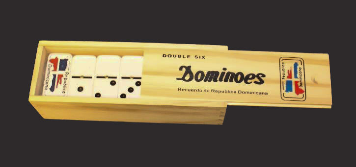 A set of dominoes in a small wooden box.