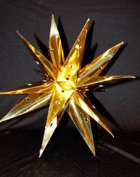 A folded paper star with numerous points