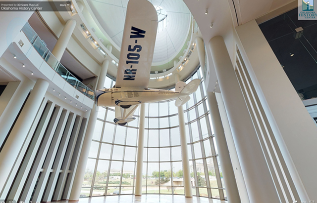 View of the replica of the Winnie Mae airplane hanging in the atrium of the Oklahoma History Center