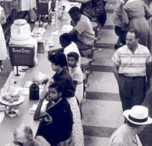 Students sitting at the Katz Drug Store lunch counter during the sit-in