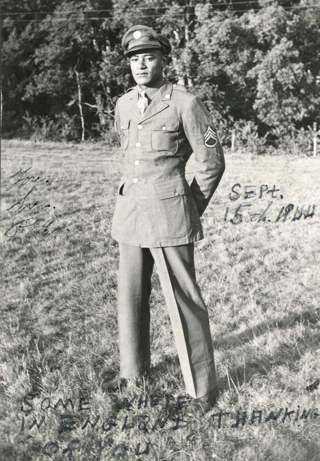 Rivers stands outdoors wearing his dress uniform. He looks directly at the camera. 