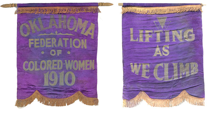 A purple and gold banners reading Lifting as We Climb and Oklahoma Federation of Colored Women 1910