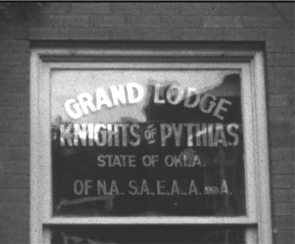 A screen capture of a glass door reading, Grand Lodge, Knights of Pythias, State of Okla.