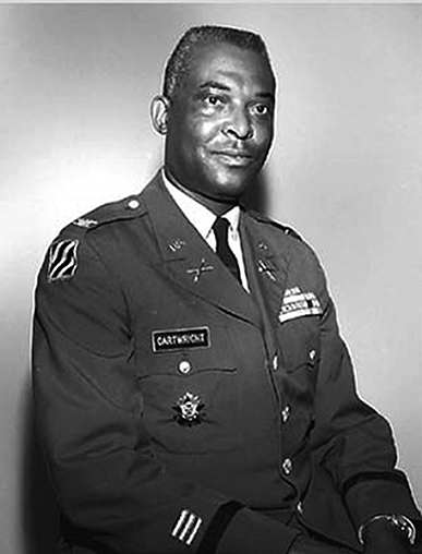 A picture of an African American General in an Army uniform, smiling.