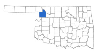 Map of Oklahoma highlighting Woodward County in the far northeastern region.