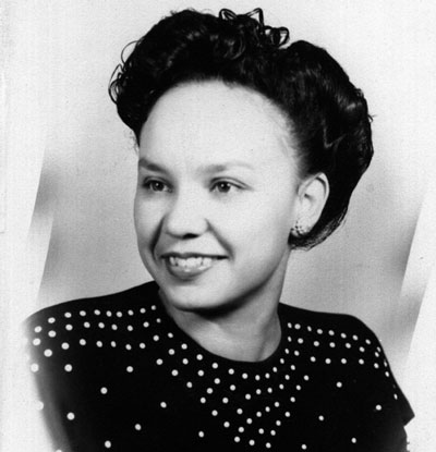 A portrait of a young smiling Juanita Stout