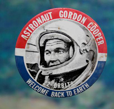 A button features a photo of Cooper and the text 'Welcome Back to Earth - 22 Orbits'
