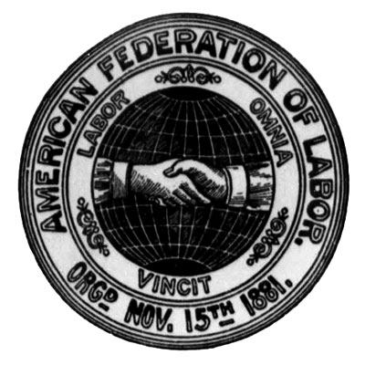 The round logo features two hands clasped together in the center. The border reads 'American Federation of Labor. Labor Omnia Vincit. Org. Nov. 15th 1881.' 