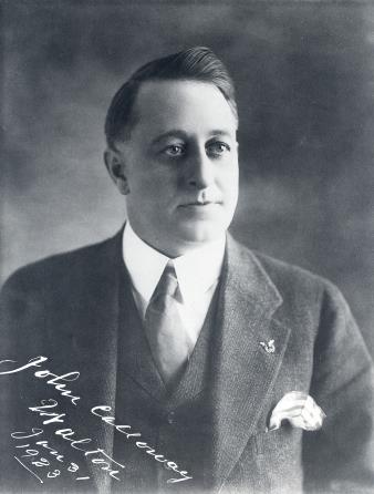 Picture of a white man in a suit with handwriting that reads 'John Calloway Walton Jan 31 1923.'
