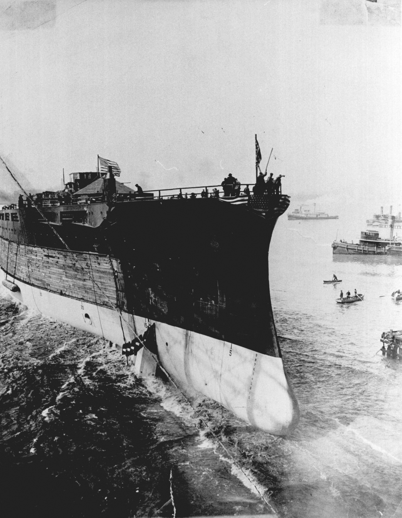 The USS Oklahoma sliding into the Delaware River after its christening