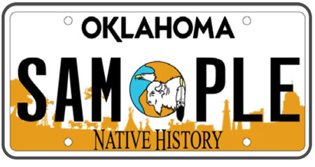 License plate with an illustration of a bald eagle and bison above reddish-brown silhouettes of a landscape with tipis, trees, the capitol